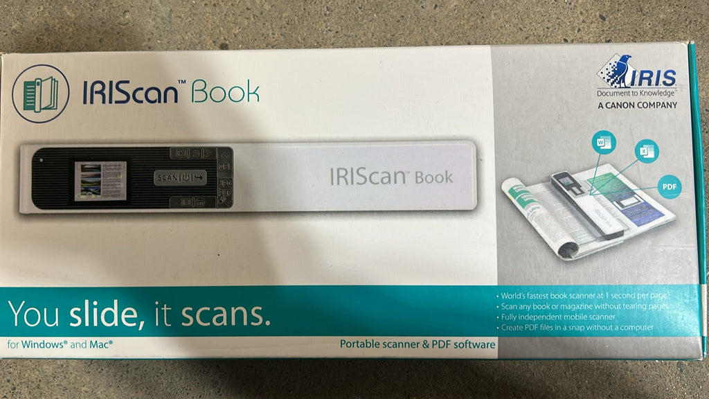 Retail packaging for the IRIScan Book 5 portable scanner showing the "You slide, it scans" slogan and highlighting its 1200DPI capability.